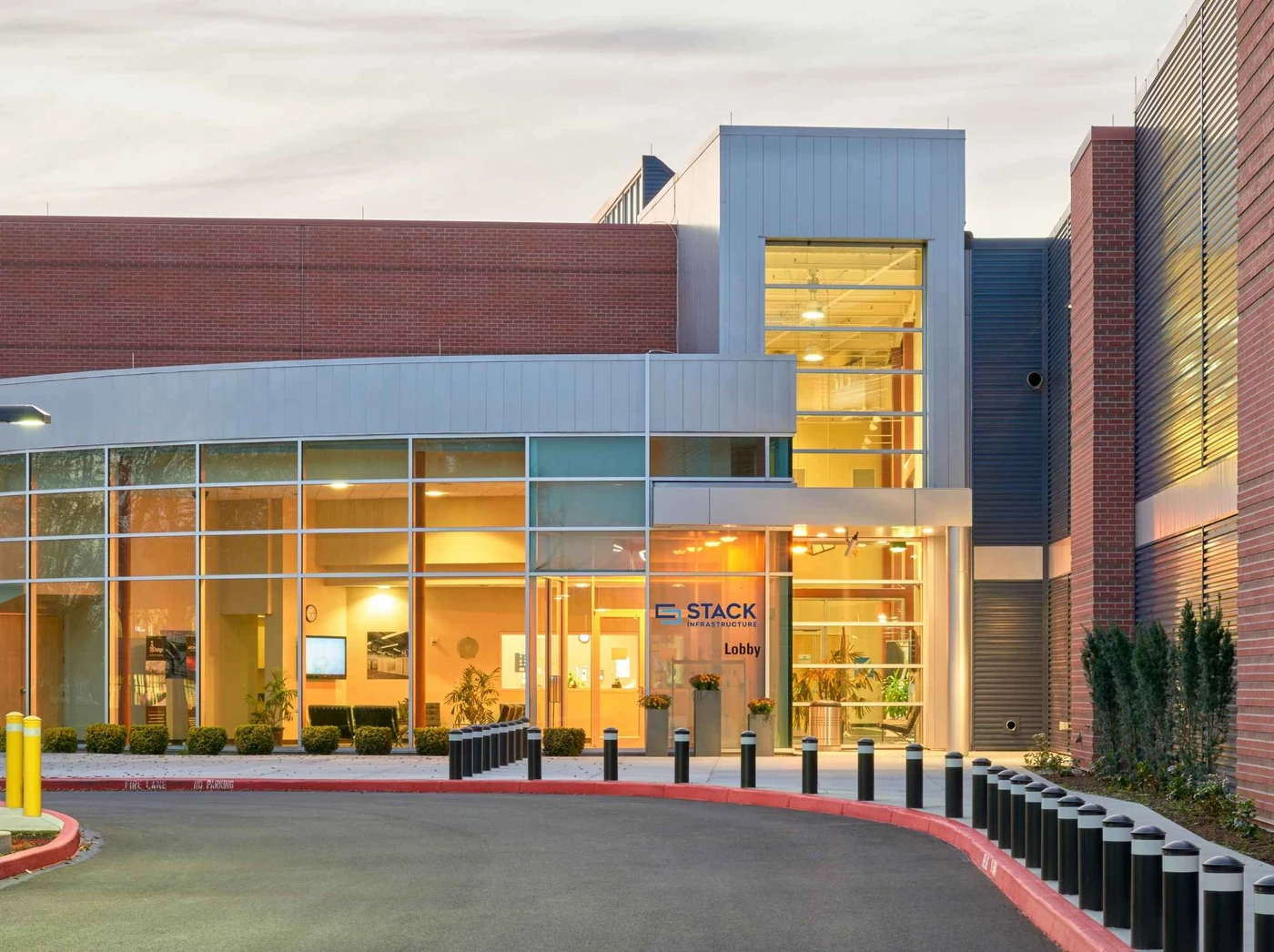 The Opus Interactive Hillsboro, Oregon data center building at dusk.