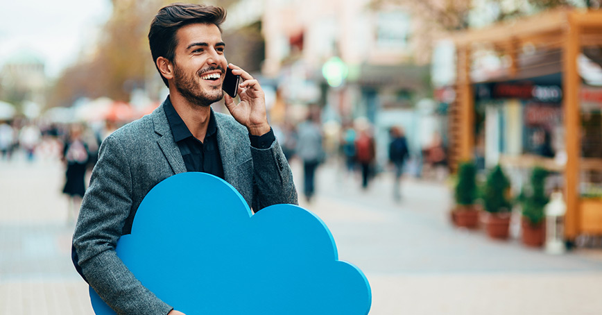 Cloud migration blog photo showing man carrying cloud.