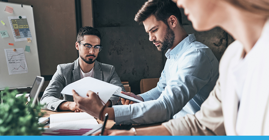 Image of enterprise team meeting portraying an example of a vmware user